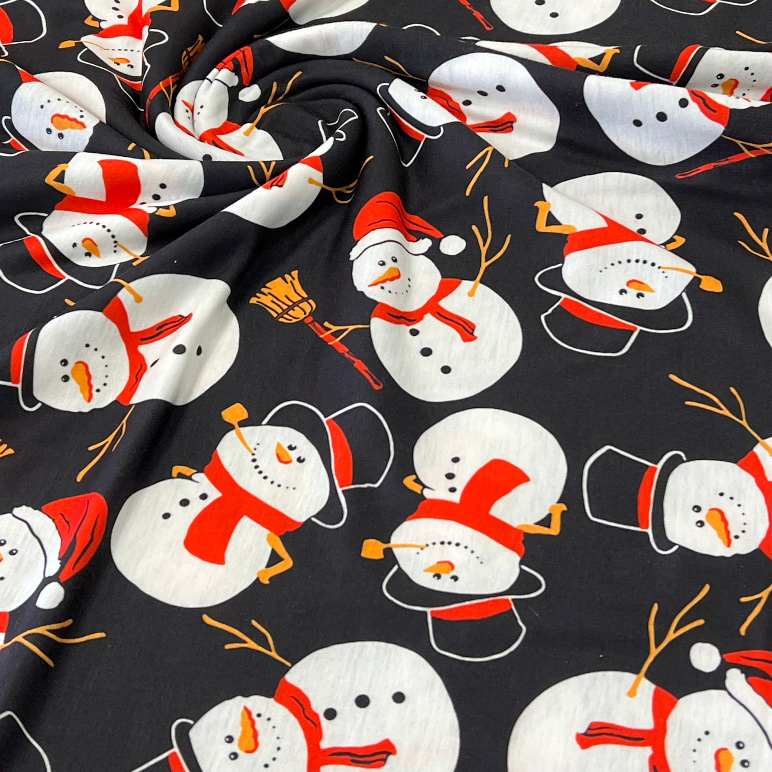 Snowman Broom Print Soft Spun Poly Stretch Fabric